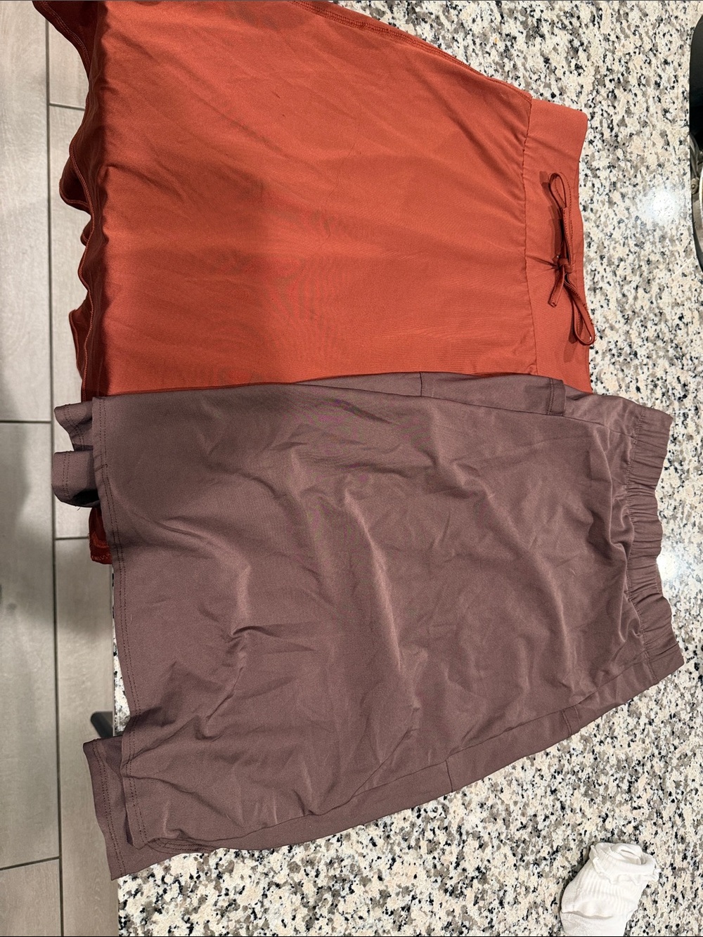 Women’s small snoga athletics rust skirt and off brand brown skirt S and XS bund